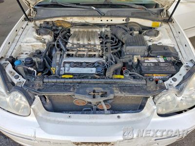 Zdjęcie 11 z 12 samochodu: 2002 HYUNDAI SONATA GLS VIN:KMHWF35H52A713588 - miniatura