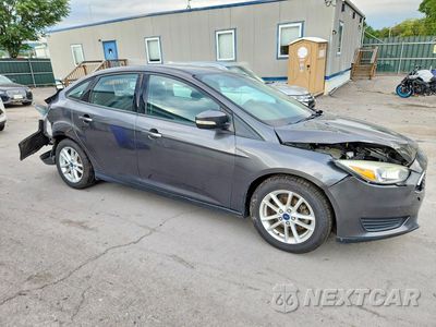Czwarte zdjęcie samochodu z boku: 2016 FORD FOCUS SE VIN:1FADP3F23GL287615 - miniatura