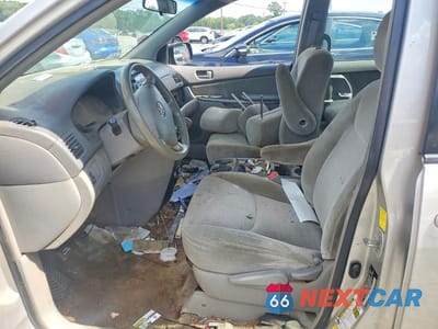 Zdjęcie 7 z 13 samochodu: 2010 TOYOTA SIENNA CE 7-PASSENGER VIN:5TDKK4CC4AS311302 - miniatura