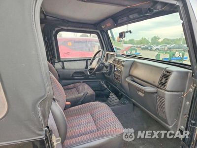 Zdjęcie 10 z 12 samochodu: 1999 JEEP WRANGLER / TJ SE VIN:1J4FY29P9XP434296 - miniatura