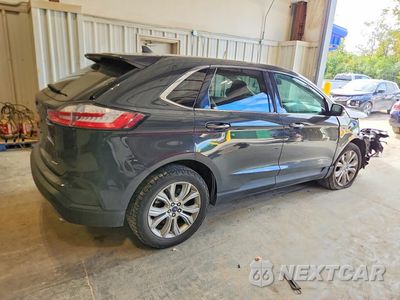 Trzecie zdjęcie samochodu z tyłu: 2021 FORD EDGE TITANIUM VIN:2FMPK4K99MBA27290 - miniatura
