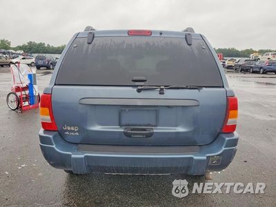 Zdjęcie 6 z 13 samochodu: 2002 JEEP GRAND CHEROKEE LAREDO VIN:1J4GW48S32C254646 - miniatura