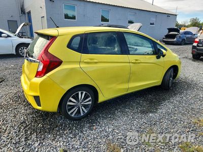 Trzecie zdjęcie samochodu z tyłu: 2016 HONDA FIT EX VIN:JHMGK5H73GX000632 - miniatura
