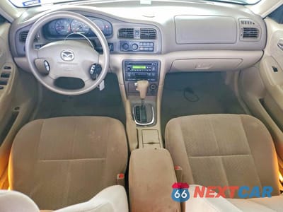 Zdjęcie 8 z 13 samochodu: 2000 MAZDA 626 ES VIN:1YVGF22C5Y5164210 - miniatura