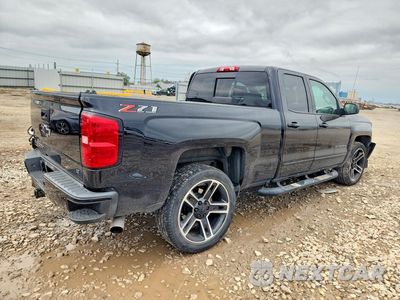 Trzecie zdjęcie samochodu z tyłu: 2018 CHEVROLET SILVERADO K1500 LT VIN:1GCVKREC8JZ211628 - miniatura