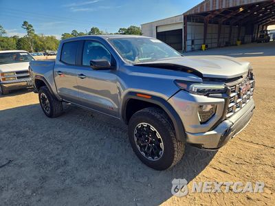 Czwarte zdjęcie samochodu z boku: 2026 GMC CANYON AT4 VIN:1GTP2DEK4T1136057 - miniatura