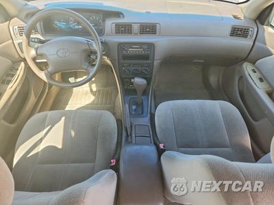 Zdjęcie 8 z 12 samochodu: 1999 TOYOTA CAMRY CE VIN:4T1BG22KXXU869069 - miniatura