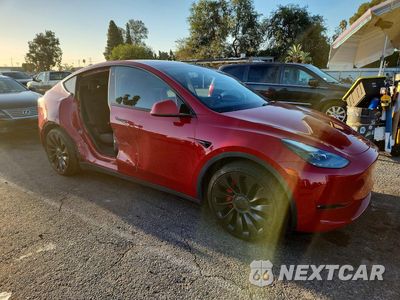 Czwarte zdjęcie samochodu z boku: 2022 TESLA MODEL Y VIN:7SAYGDEF0NF520617 - miniatura