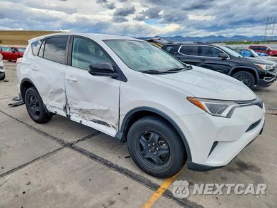 Czwarte zdjęcie samochodu z boku: 2017 TOYOTA RAV4 LE VIN:2T3BFREV1HW632495 - miniatura