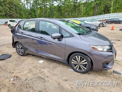 Czwarte zdjęcie samochodu z boku: 2016 HONDA FIT EX VIN:JHMGK5H76GX033821 - miniatura