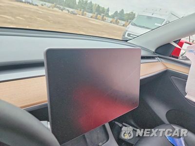Zdjęcie 9 z 12 samochodu: 2023 TESLA MODEL Y VIN:7SAYGAEE6PF865191 - miniatura