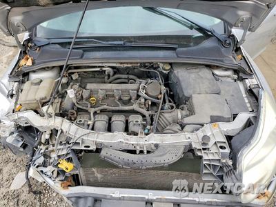 Zdjęcie 11 z 13 samochodu: 2014 FORD FOCUS SE VIN:1FADP3F24EL217179 - miniatura