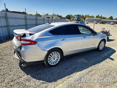 Trzecie zdjęcie samochodu z tyłu: 2016 FORD FUSION S HYBRID VIN:3FA6P0UU8GR157794 - miniatura