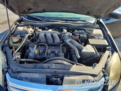 Zdjęcie 11 z 12 samochodu: 2009 FORD FUSION SE VIN:3FAHP01199R135910 - miniatura
