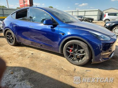 Czwarte zdjęcie samochodu z boku: 2022 TESLA MODEL Y VIN:7SAYGDEF1NF381937 - miniatura