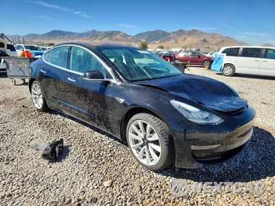 Czwarte zdjęcie samochodu z boku: 2018 TESLA MODEL 3 VIN:5YJ3E1EA7JF023669 - miniatura