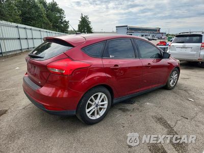 Trzecie zdjęcie samochodu z tyłu: 2017 FORD FOCUS SE VIN:1FADP3K24HL231657 - miniatura