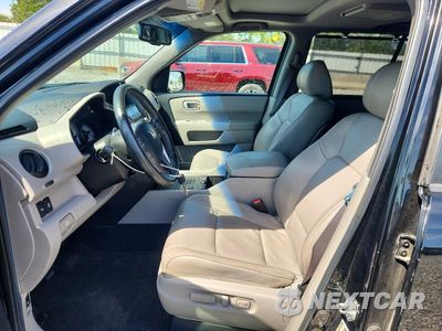 Zdjęcie 7 z 13 samochodu: 2013 HONDA PILOT TOURING VIN:5FNYF4H94DB015572 - miniatura