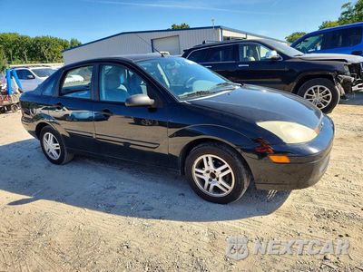 Czwarte zdjęcie samochodu z boku: 2003 FORD FOCUS SE COMFORT VIN:1FAFP34353W126714 - miniatura