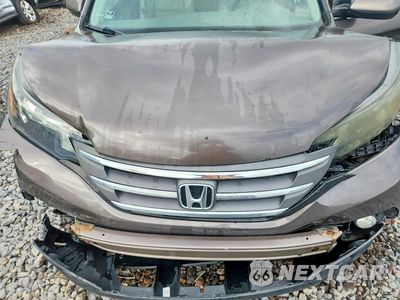 Zdjęcie 12 z 13 samochodu: 2014 HONDA CR-V EXL VIN:2HKRM4H78EH718684 - miniatura