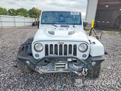 Piąte zdjęcie samochodu w środku: 2016 JEEP WRANGLER UNLIMITED SAHARA VIN:1C4BJWEG2GL245129 - miniatura