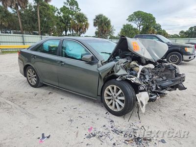 Czwarte zdjęcie samochodu z boku: 2014 TOYOTA CAMRY HYBRID XLE VIN:4T1BD1FK4EU126885 - miniatura