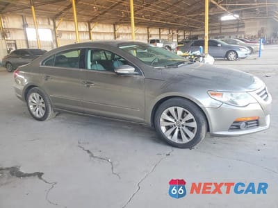 Czwarte zdjęcie samochodu z boku: 2011 VOLKSWAGEN CC LUXURY VIN:WVWHP7AN1BE705607 - miniatura