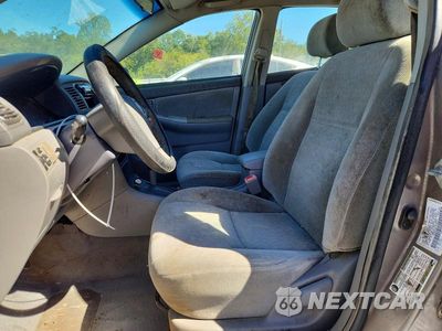 Zdjęcie 7 z 12 samochodu: 2004 TOYOTA COROLLA CE VIN:1NXBR32E64Z259613 - miniatura