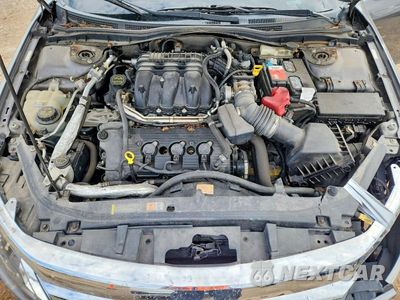 Zdjęcie 11 z 13 samochodu: 2010 FORD FUSION SE VIN:3FAHP0HG3AR342470 - miniatura