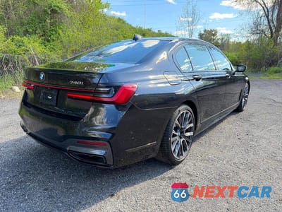 Czwarte zdjęcie samochodu z boku: 2022 BMW 740 XI VIN:WBA7T4C03NCK23662 - miniatura