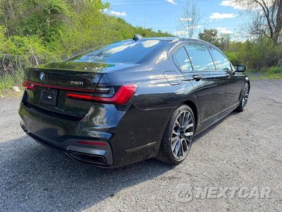 Czwarte zdjęcie samochodu z boku: 2022 BMW 7ER XI VIN:WBA7T4C03NCK23662 - miniatura