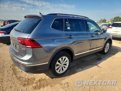 Trzecie zdjęcie samochodu z tyłu: 2018 VOLKSWAGEN TIGUAN SE VIN:3VV2B7AX9JM169957 - miniatura