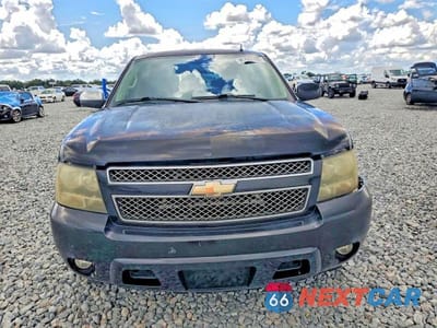 Piąte zdjęcie samochodu w środku: 2011 CHEVROLET SUBURBAN C1500 LT VIN:1GNSCJE07BR317844 - miniatura