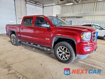 Czwarte zdjęcie samochodu z boku: 2018 GMC SIERRA K1500 SLT VIN:3GTU2NEC2JG284501 - miniatura
