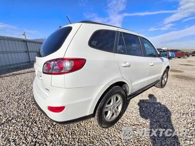 Trzecie zdjęcie samochodu z tyłu: 2012 HYUNDAI SANTA FE GLS VIN:5XYZGDAB0CG099993 - miniatura