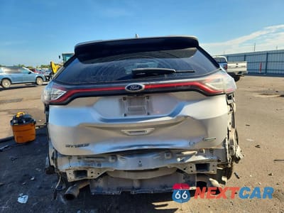 Zdjęcie 6 z 13 samochodu: 2016 FORD EDGE SE VIN:2FMPK3G90GBB70796 - miniatura