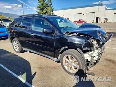 Czwarte zdjęcie samochodu z boku: 2009 LEXUS RX 350 VIN:2T2GK31UX9C073788 - miniatura