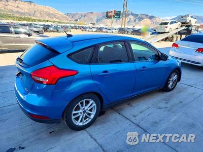 Trzecie zdjęcie samochodu z tyłu: 2016 FORD FOCUS VIN:1FADP3K22GL362777 - miniatura