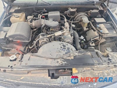 Zdjęcie 12 z 13 samochodu: 1999 CHEVROLET SUBURBAN C1500 VIN:3GNEC16R2XG105645 - miniatura