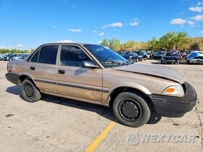Czwarte zdjęcie samochodu z boku: 1989 TOYOTA COROLLA DELUXE VIN:1NXAE92E6KZ063257 - miniatura