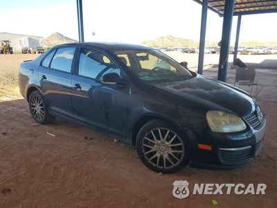 Czwarte zdjęcie samochodu z boku: 2007 VOLKSWAGEN JETTA WOLFSBURG VIN:3VWEF71K87M157051 - miniatura
