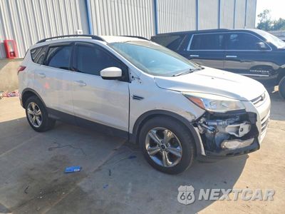 Czwarte zdjęcie samochodu z boku: 2015 FORD ESCAPE SE VIN:1FMCU9G90FUB09890 - miniatura