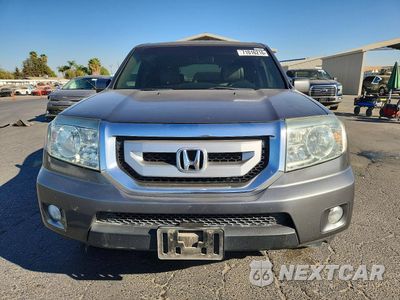 Piąte zdjęcie samochodu w środku: 2011 HONDA PILOT EXL VIN:5FNYF4H64BB007264 - miniatura