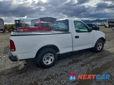 Trzecie zdjęcie samochodu z tyłu: 2002 FORD F150 VIN:1FTRF172X2KC00555 - miniatura