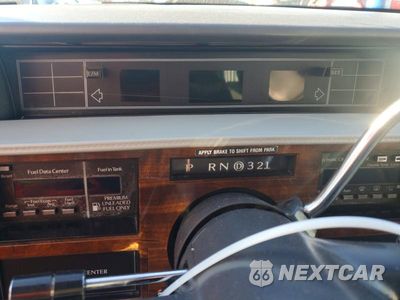 Zdjęcie 9 z 12 samochodu: 1992 CADILLAC DEVILLE VIN:1G6CD53BXN4212371 - miniatura