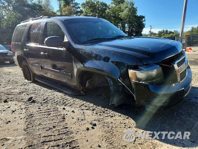 Czwarte zdjęcie samochodu z boku: 2011 CHEVROLET TAHOE K1500 LT VIN:1GNSKBE09BR185761 - miniatura