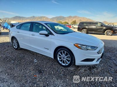 Czwarte zdjęcie samochodu z boku: 2017 FORD FUSION SE HYBRID VIN:3FA6P0LU3HR357663 - miniatura