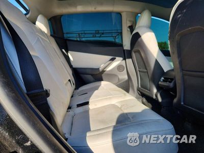 Zdjęcie 11 z 14 samochodu: 2022 TESLA MODEL Y VIN:7SAYGDEFXNF338505 - miniatura