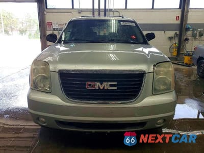 Piąte zdjęcie samochodu w środku: 2010 GMC YUKON SLT VIN:1GKUKCE04AR123369 - miniatura