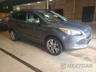 Czwarte zdjęcie samochodu z boku: 2014 FORD ESCAPE SE VIN:1FMCU9GX8EUA01546 - miniatura